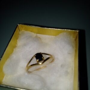 Gold Ring with Black Stone - Elegant Women's Jewelry